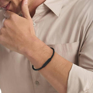 Ανδρικό βραχιόλι Calvin Klein 35000424 από μαύρο δέρμα με μαύρη αγκράφα.